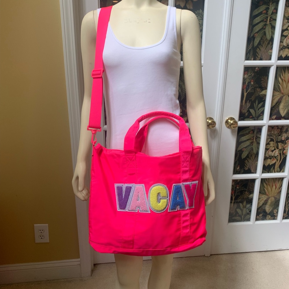Hot Pink VACAY large zip bag with handles and adjustable shoulder strap